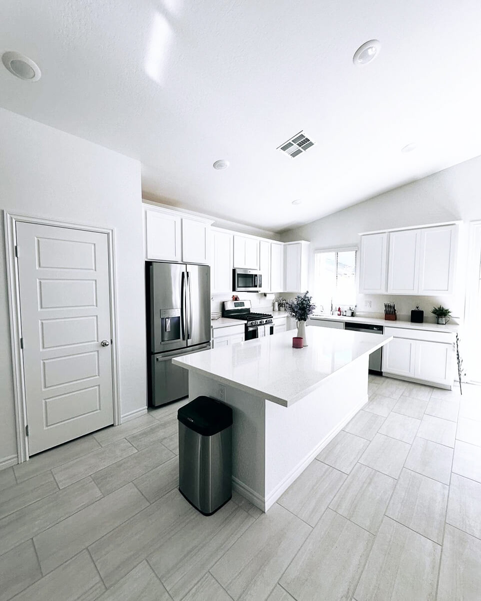 Fully unpacked luxury kitchen by Lifelystyle move-in concierge team on Day One — Summerlin, Las Vegas — every drawer organized, every cabinet styled, evening-ready